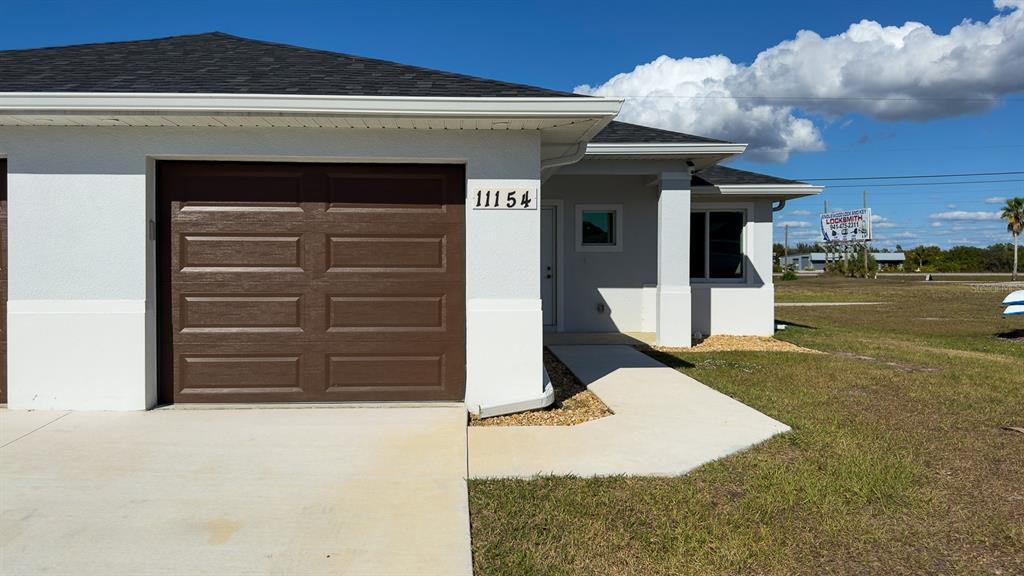 11154 Pendleton Avenue Englewood, FL 34224 - Photo 6 of 32 a view of a house with a space