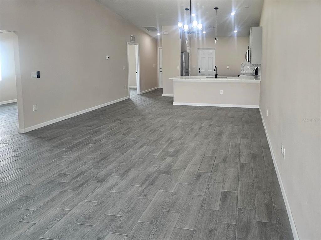 11154 Pendleton Avenue Englewood, FL 34224 - Photo 7 of 32 a view of kitchen with sink and natural light