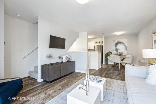 a view of a utility room with closet and washer