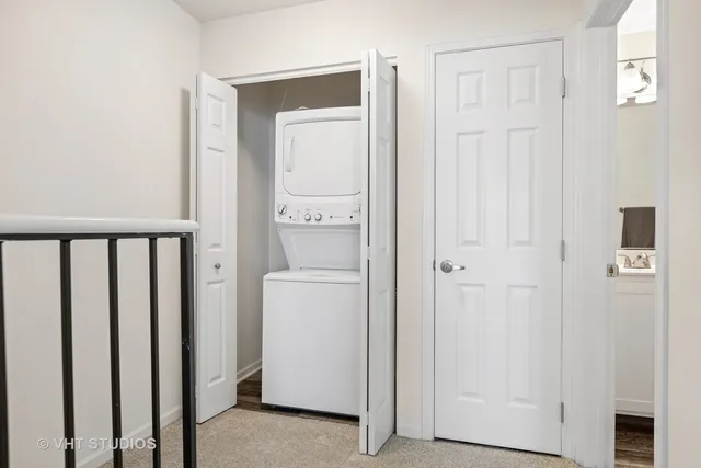 a view of a kitchen with a sink and a microwave