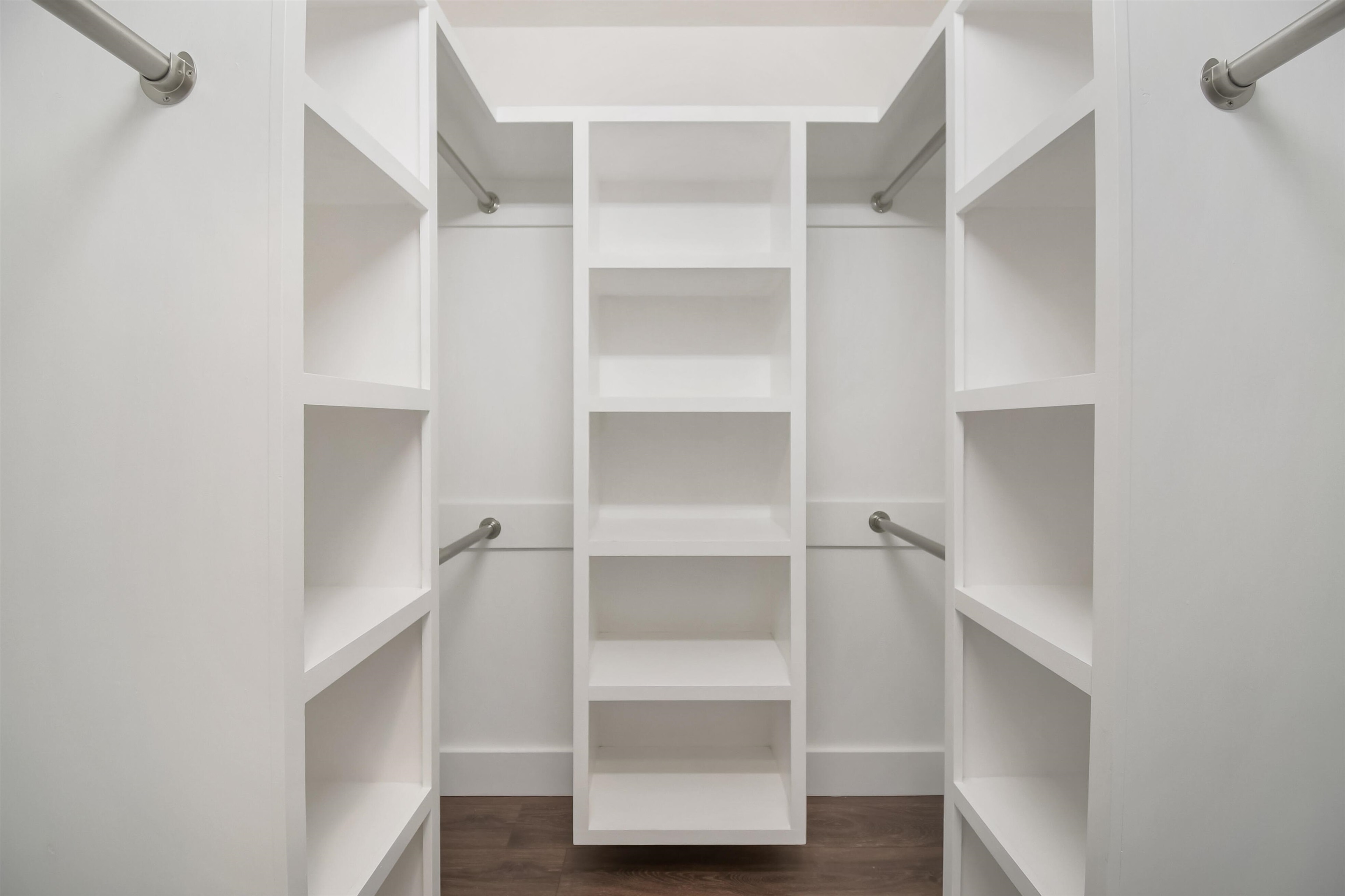 497 Pyrus Street St. Augustine, FL 32080 - Photo 13 of 36 a view of walk in closet with empty racks