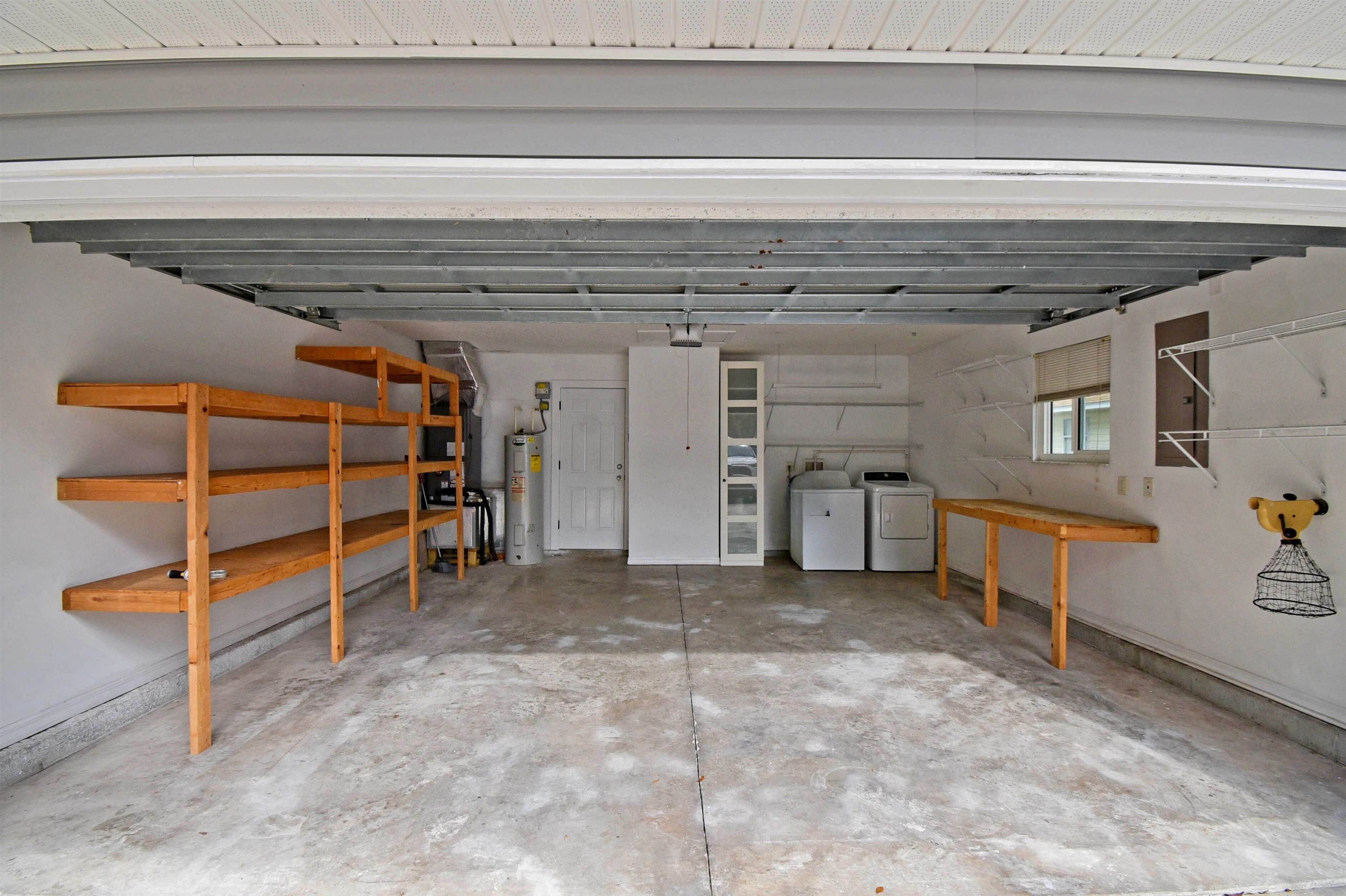 497 Pyrus Street St. Augustine, FL 32080 - Photo 34 of 36 Garage with separate washer and dryer and electric water heater