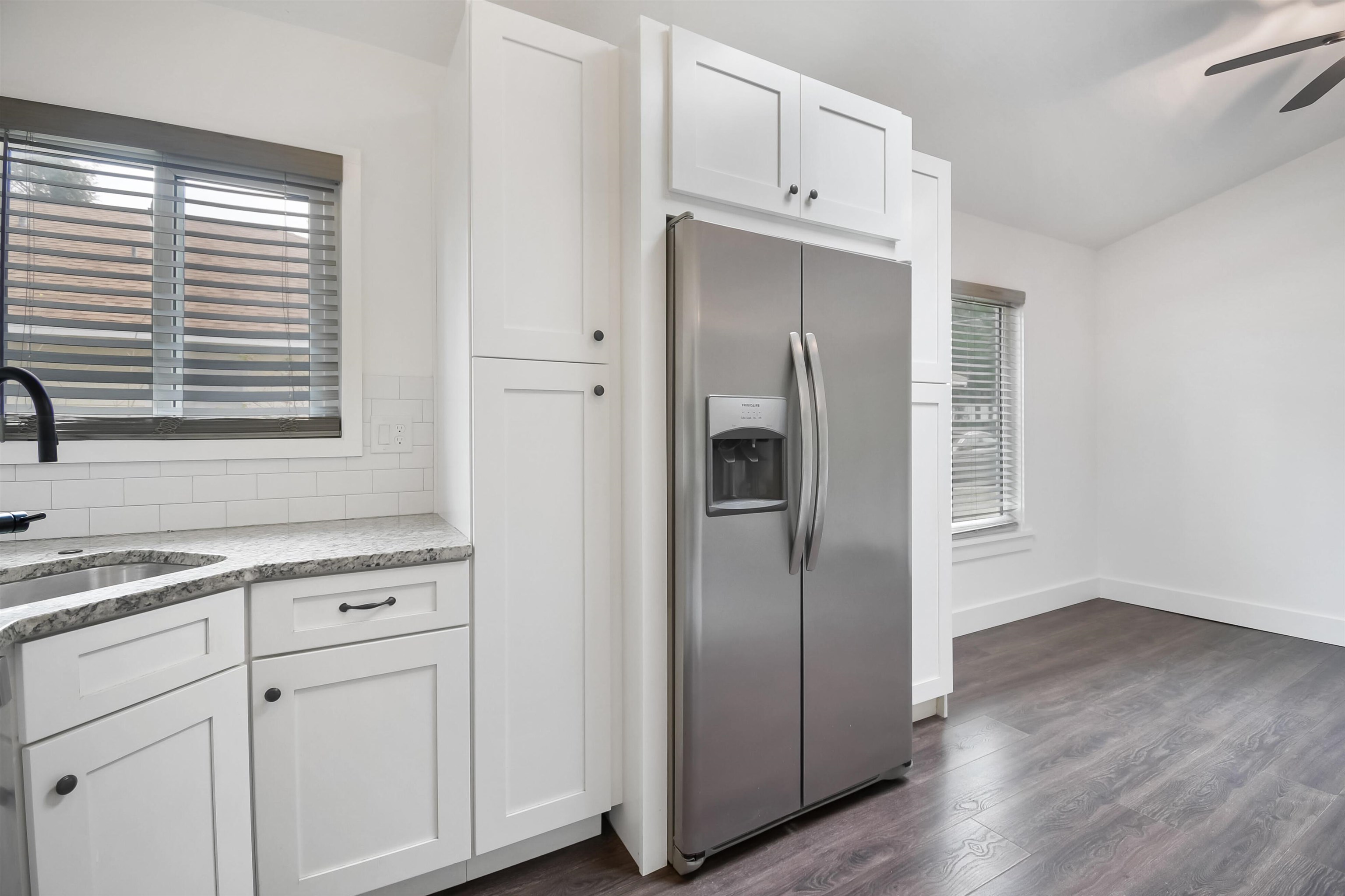 497 Pyrus Street St. Augustine, FL 32080 - Photo 7 of 36 a kitchen with stainless steel appliances a refrigerator sink and cabinets
