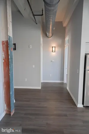 a view of empty room with closet