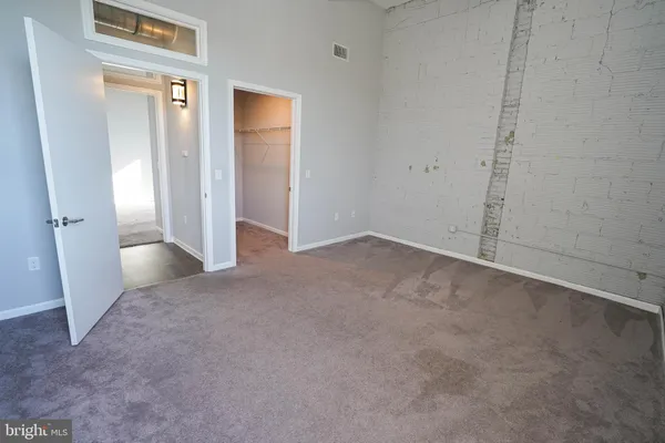 a view of a room with shelf with the shower