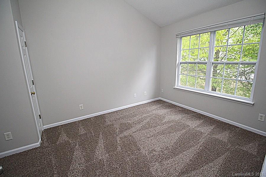 10503 Prairie Ridge Lane Charlotte, NC 28213 - Photo 8 of 9 a view of an empty room with a window