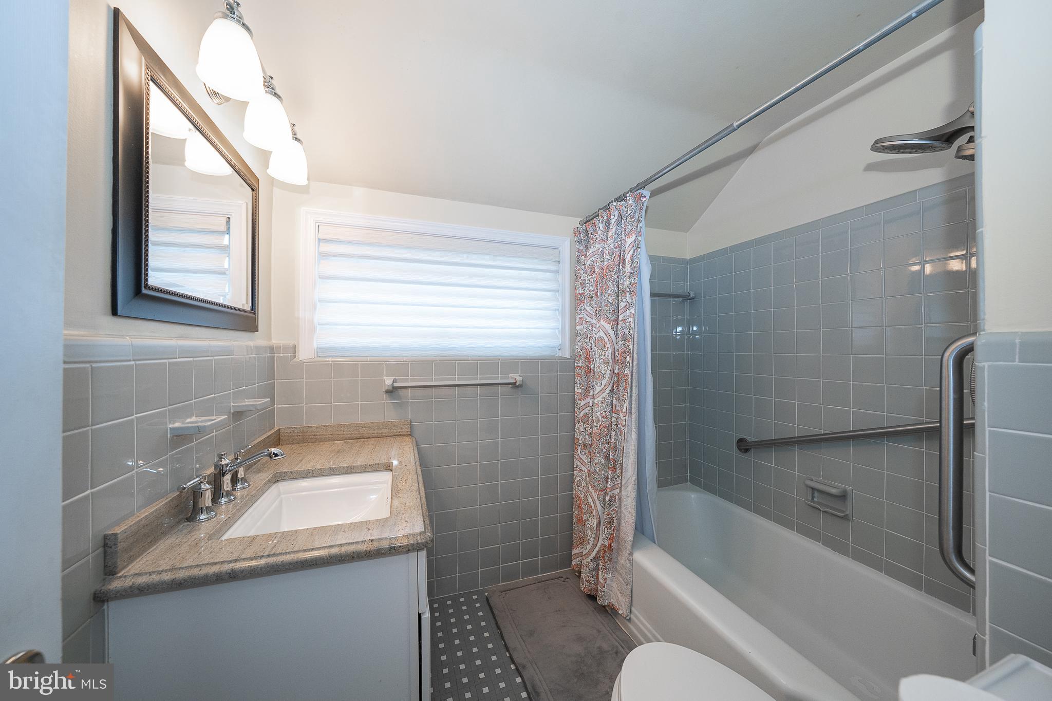 809 Matsons Ford Road Villanova, PA 19085 - Photo 17 of 24 a bathroom with a sink toilet and shower