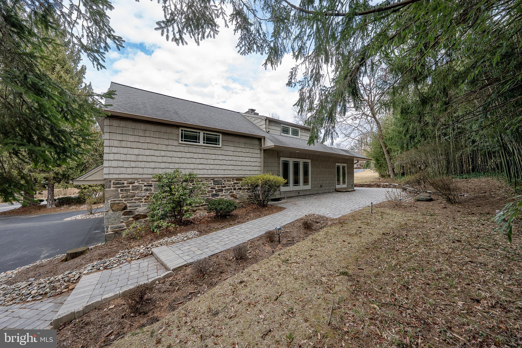 809 Matsons Ford Road Villanova, PA 19085 - Photo 24 of 24 a front view of a house with a garden