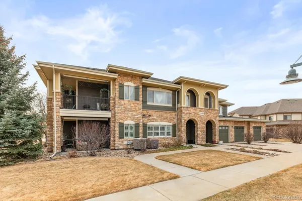 a front view of a house with yard