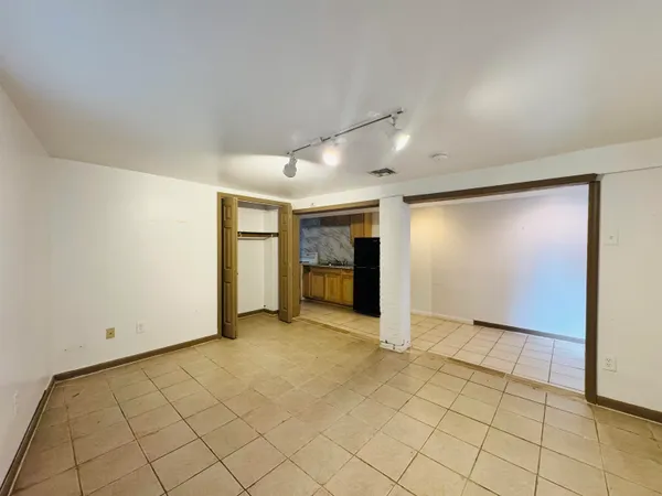 a bathroom with a sink toilet and mirror