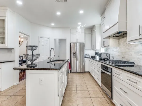 $3,900 | 7110 Waterbury Drive, Rowlett, TX 75089