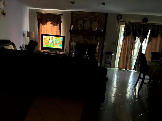 a kitchen with a sink stove top oven and cabinets