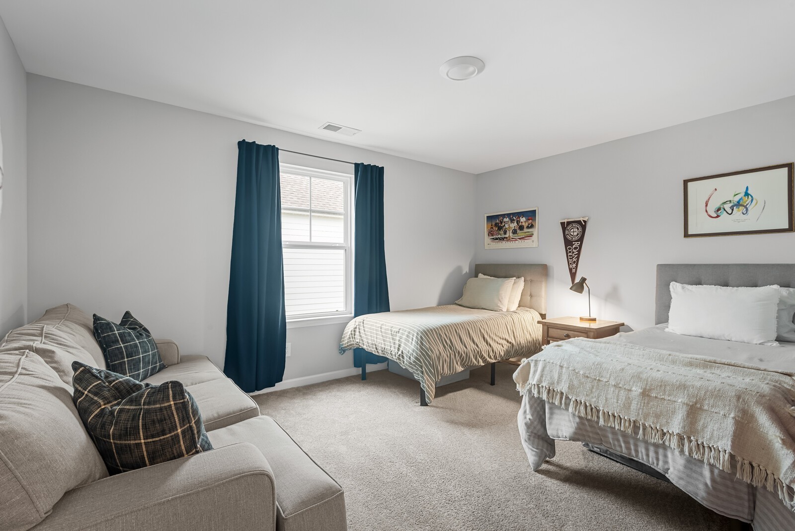 6004 Venable Court Fairview, TN 37062 - Photo 14 of 27 a spacious bedroom with two beds and a couch