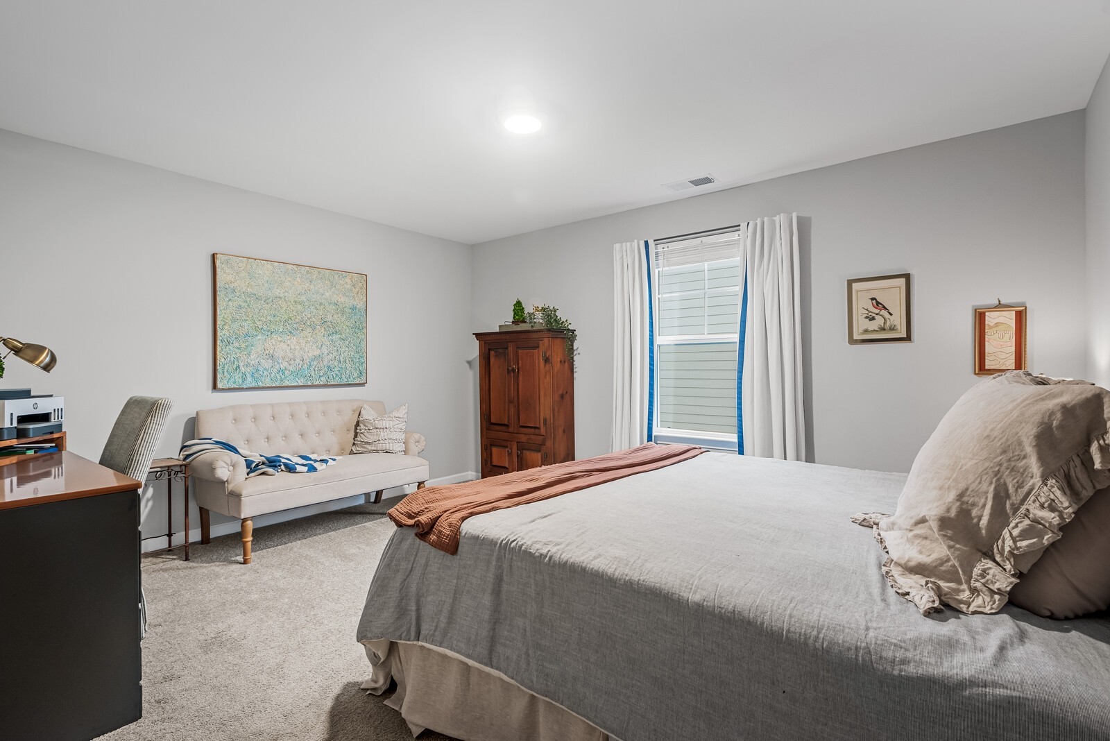 6004 Venable Court Fairview, TN 37062 - Photo 17 of 27 a bedroom with a bed and wooden floor