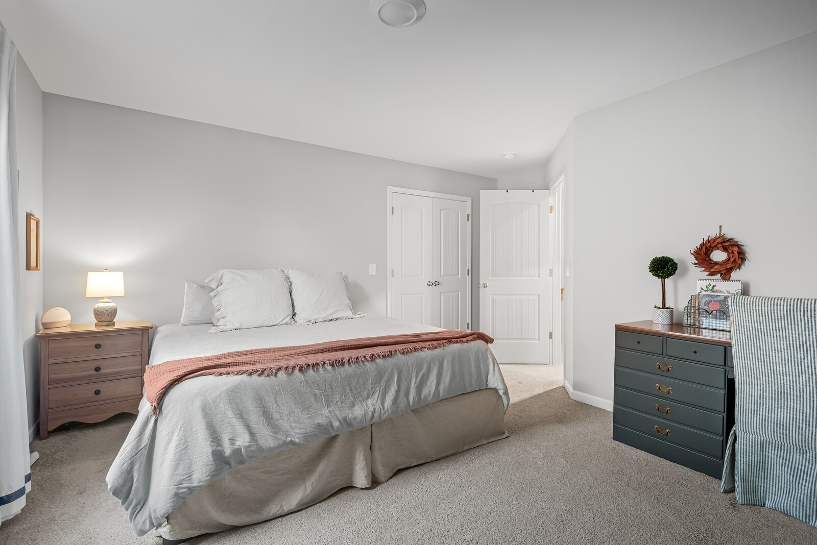 6004 Venable Court Fairview, TN 37062 - Photo 18 of 27 a bedroom with a bed and a dresser