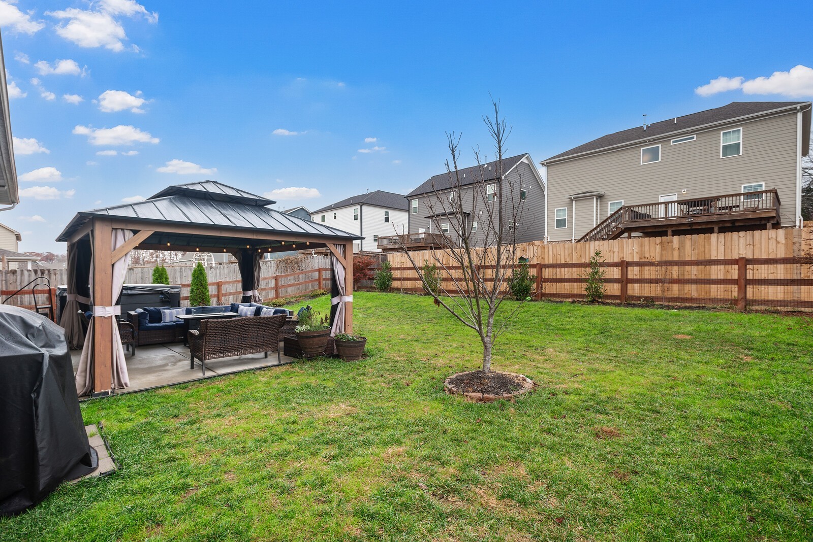 6004 Venable Court Fairview, TN 37062 - Photo 24 of 27 a view of a house with a yard porch and sitting area