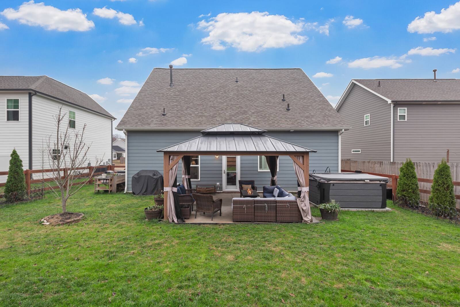6004 Venable Court Fairview, TN 37062 - Photo 25 of 27 a view of a house with backyard and sitting area