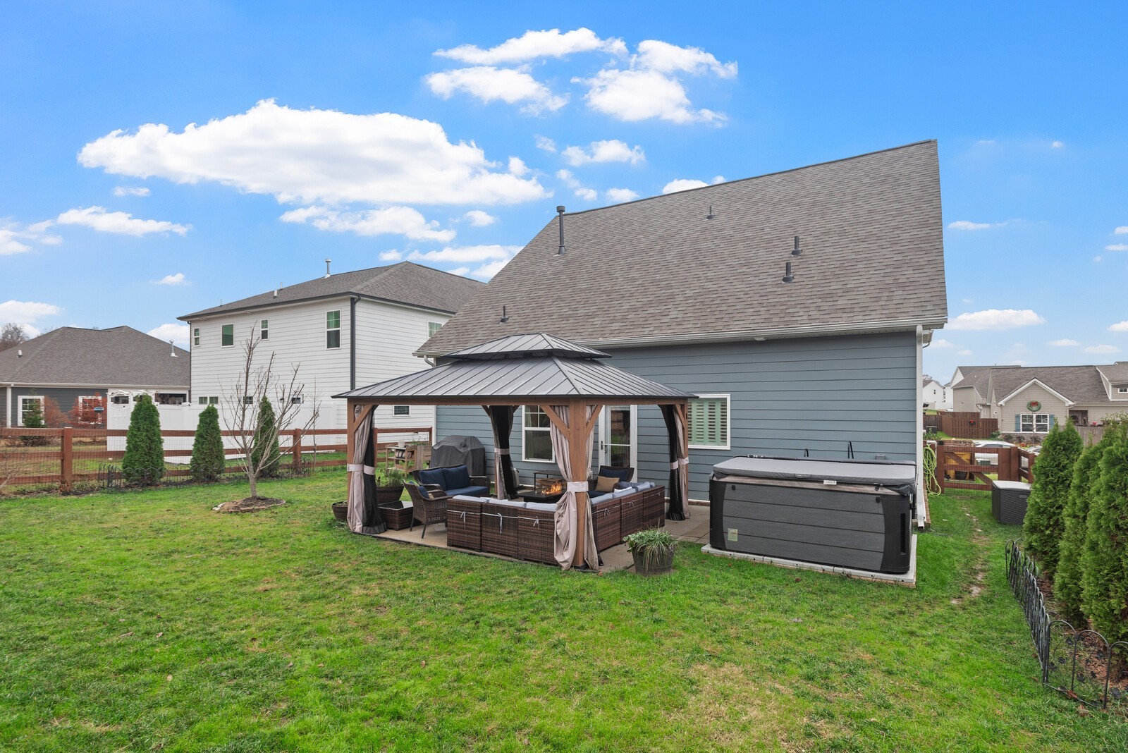 6004 Venable Court Fairview, TN 37062 - Photo 26 of 27 a view of a house with a backyard