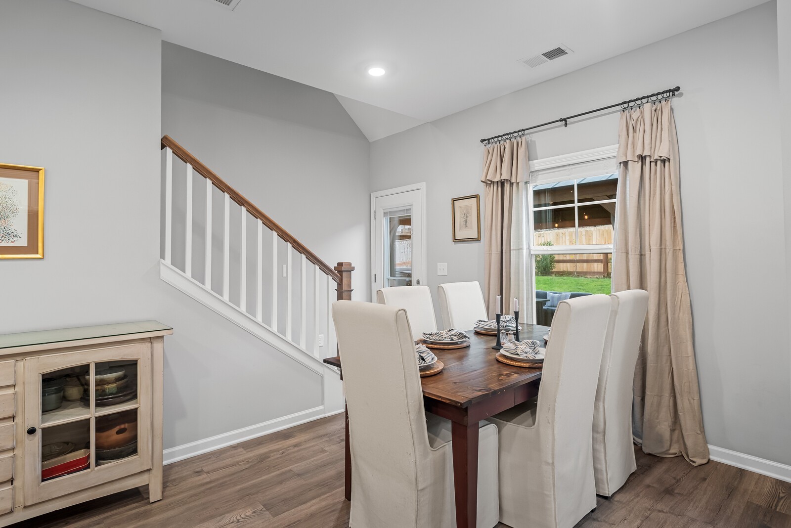 6004 Venable Court Fairview, TN 37062 - Photo 7 of 27 a view of a dining room with furniture and wooden floor