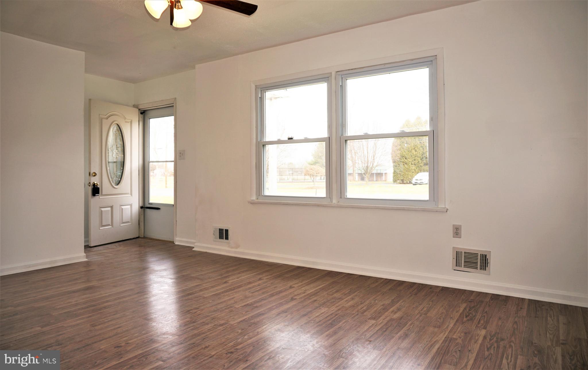 3328 Dublin Manor Road Street, MD 21154 - Photo 10 of 45 Living Room with new laminate wood grainn Floor