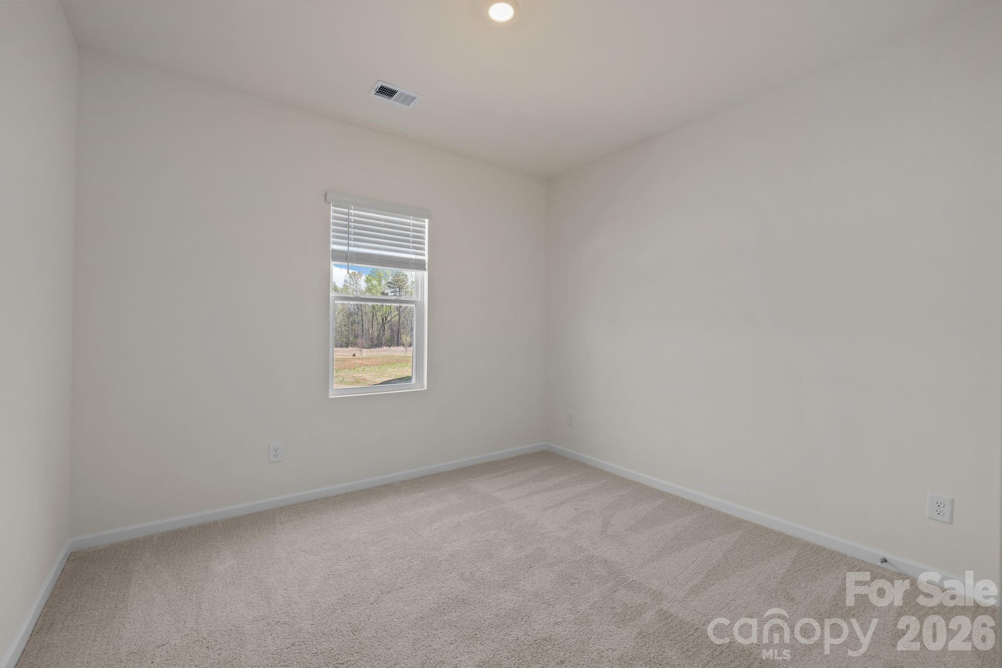 463 Brick House Road York, SC 29745 - Photo 18 of 35 a view of an empty room with a window