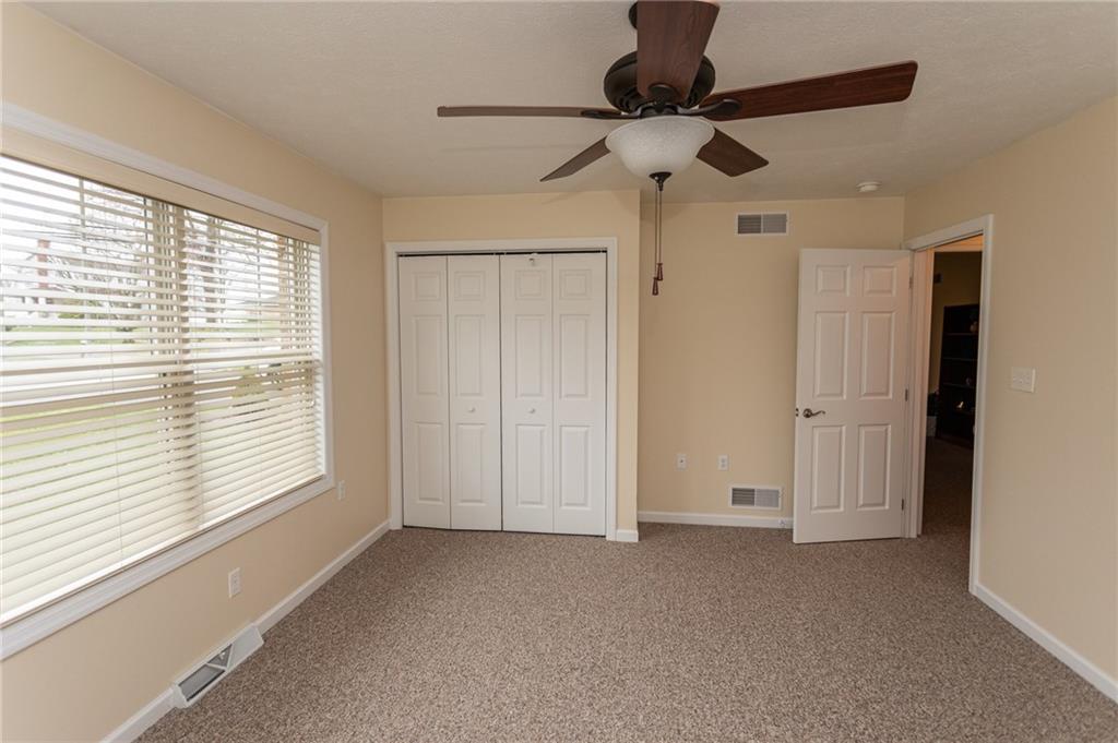 320 Dixon Boulevard Uniontown, PA 15401 - Photo 19 of 31 a view of empty room with ceiling fan and window