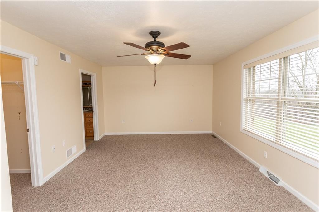 320 Dixon Boulevard Uniontown, PA 15401 - Photo 21 of 31 a view of a room with a ceiling fan and a window