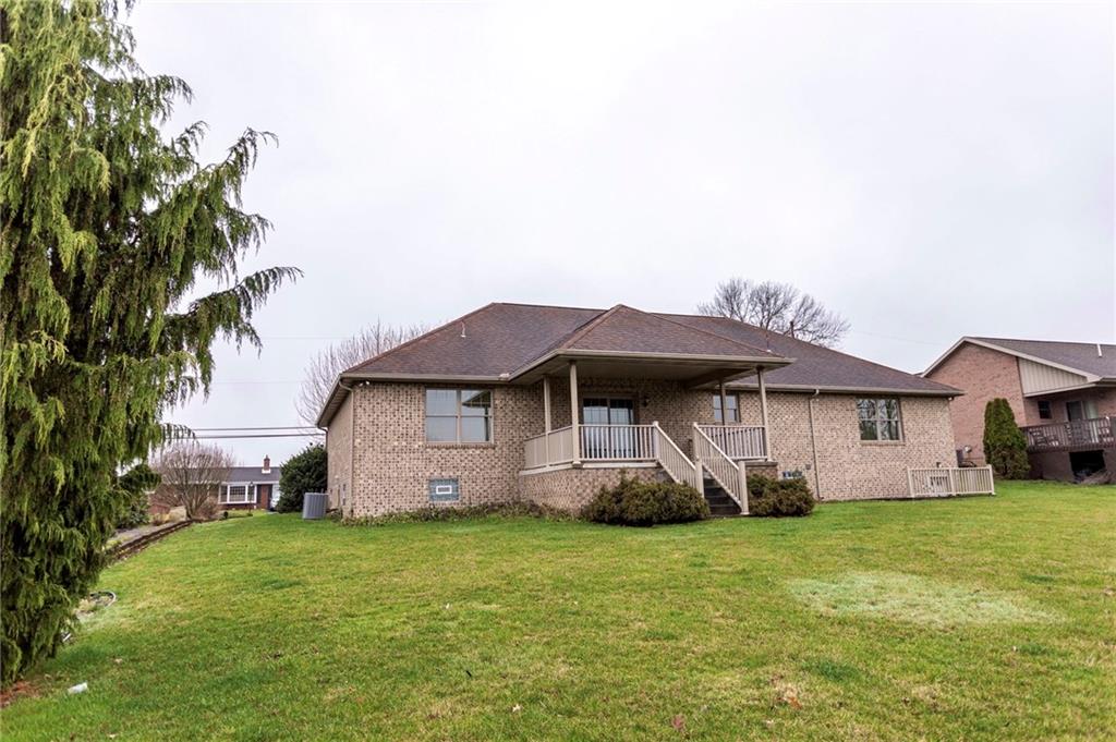 320 Dixon Boulevard Uniontown, PA 15401 - Photo 4 of 31 a front view of house with yard and green space