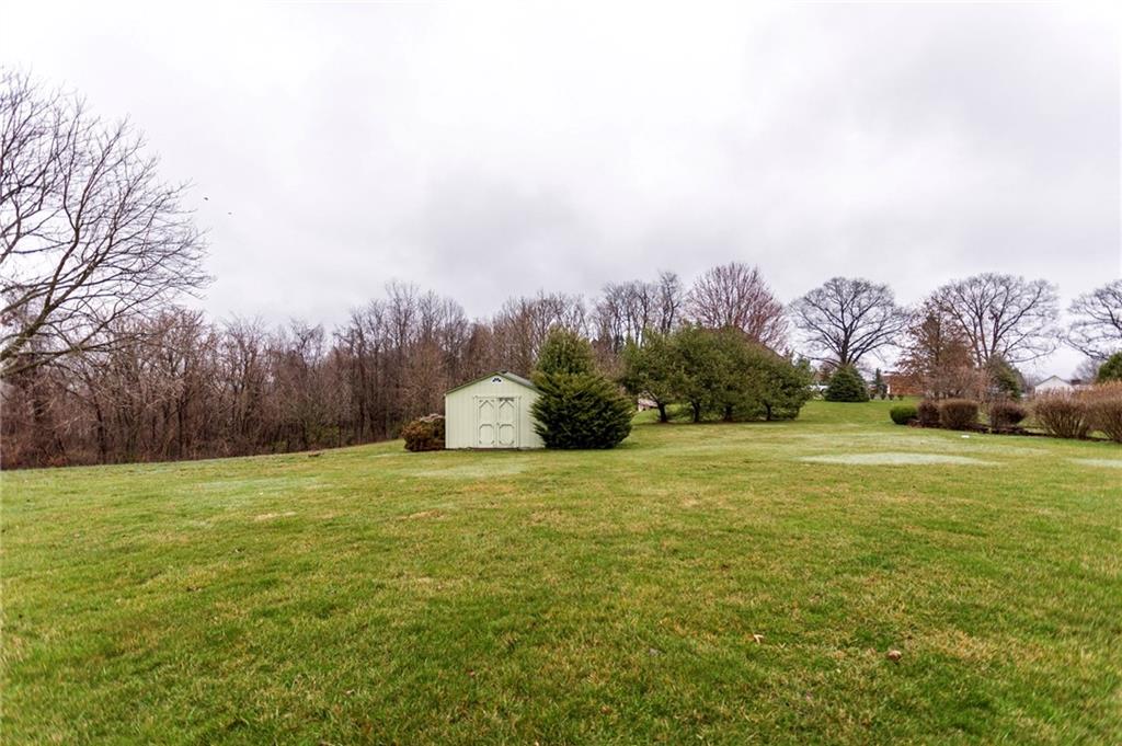 320 Dixon Boulevard Uniontown, PA 15401 - Photo 6 of 31 a view of a field with trees in the background