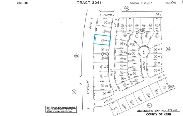 a picture of a bathroom with a shower and a curtain