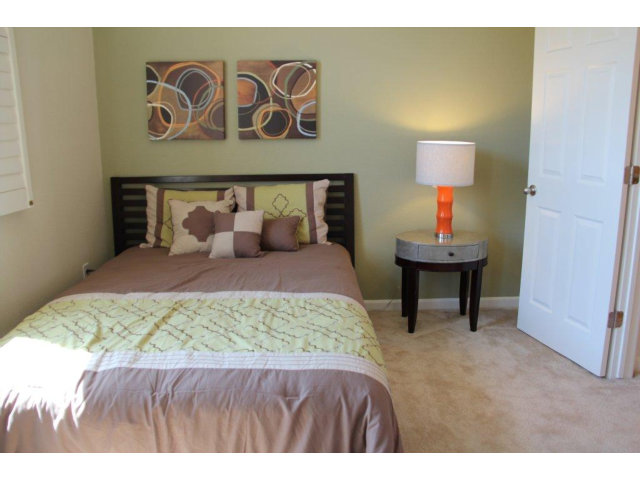 1812 Snell Place Milpitas, CA 95035 - Photo 11 of 19 a bedroom with a bed and a table