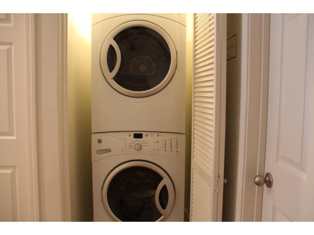 1812 Snell Place Milpitas, CA 95035 - Photo 12 of 19 a view of a hallway with washer and dryer