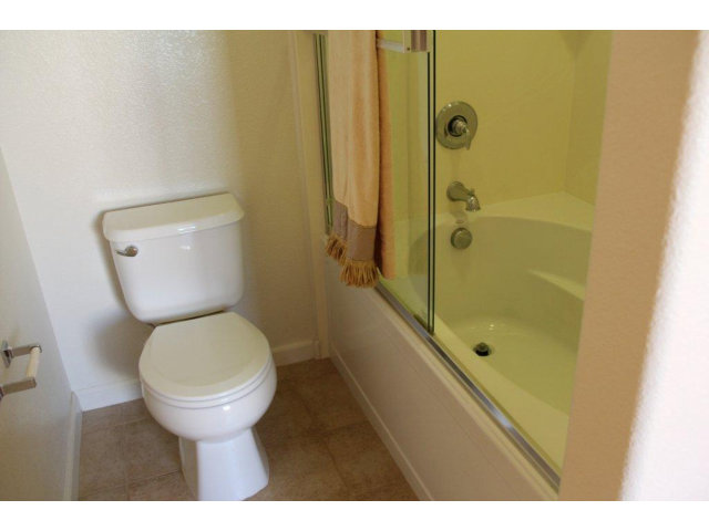 1812 Snell Place Milpitas, CA 95035 - Photo 9 of 19 a bathroom with a toilet and a shower