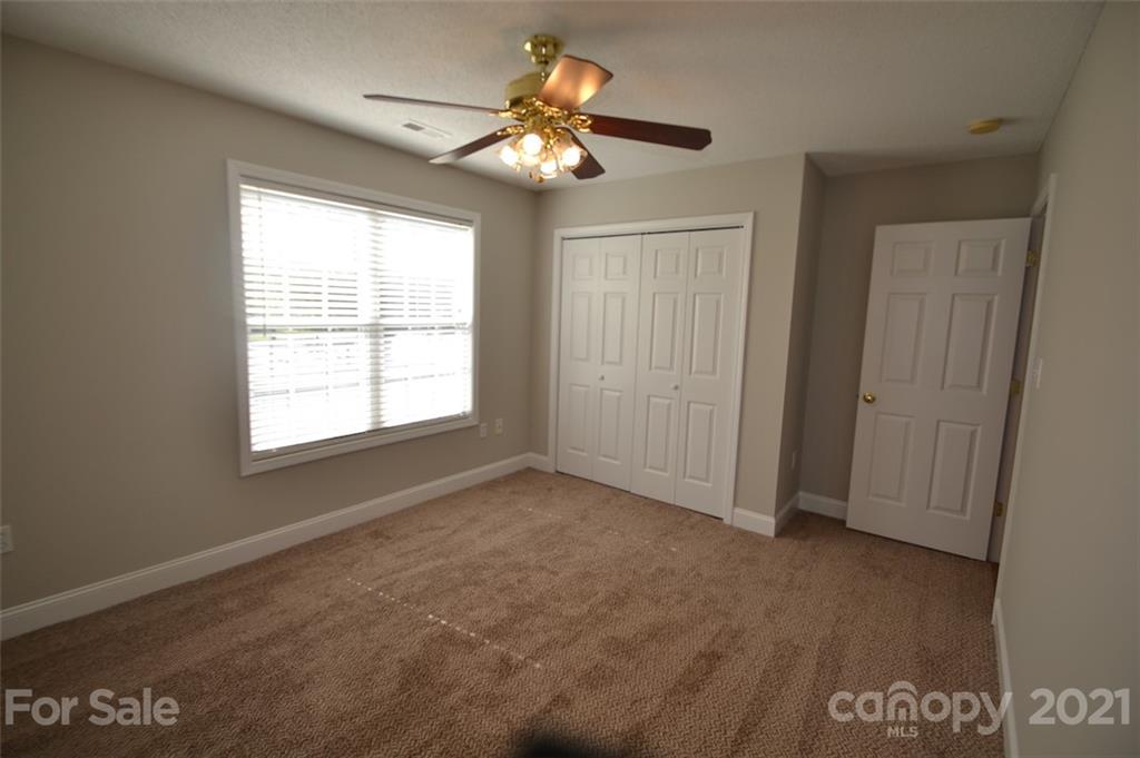 3622 Lee Moore Road Maiden, NC 28650 - Photo 15 of 34 a view of an empty room with a window