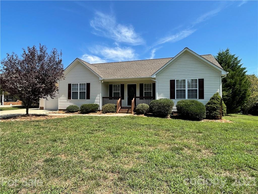 3622 Lee Moore Road Maiden, NC 28650 - Photo 26 of 34 a front view of house with yard and trees