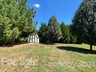 3622 Lee Moore Road Maiden, NC 28650 - Photo 27 of 34 a view of a yard with a house