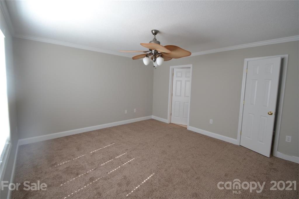 3622 Lee Moore Road Maiden, NC 28650 - Photo 9 of 34 a view of a chandelier fan in a room