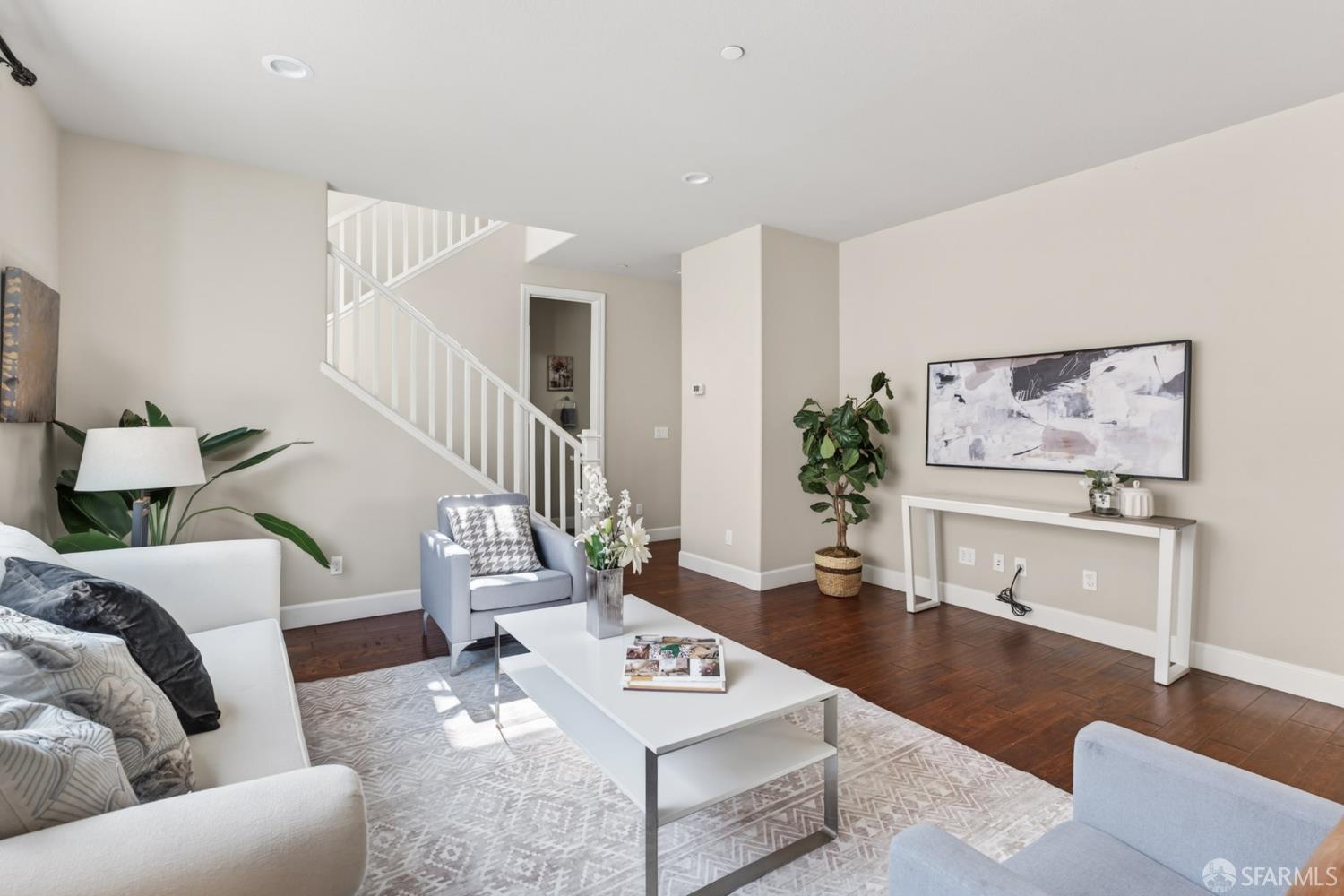 360 Gerald Circle Milpitas, CA 95035 - Photo 14 of 46 a living room with furniture and wooden floor