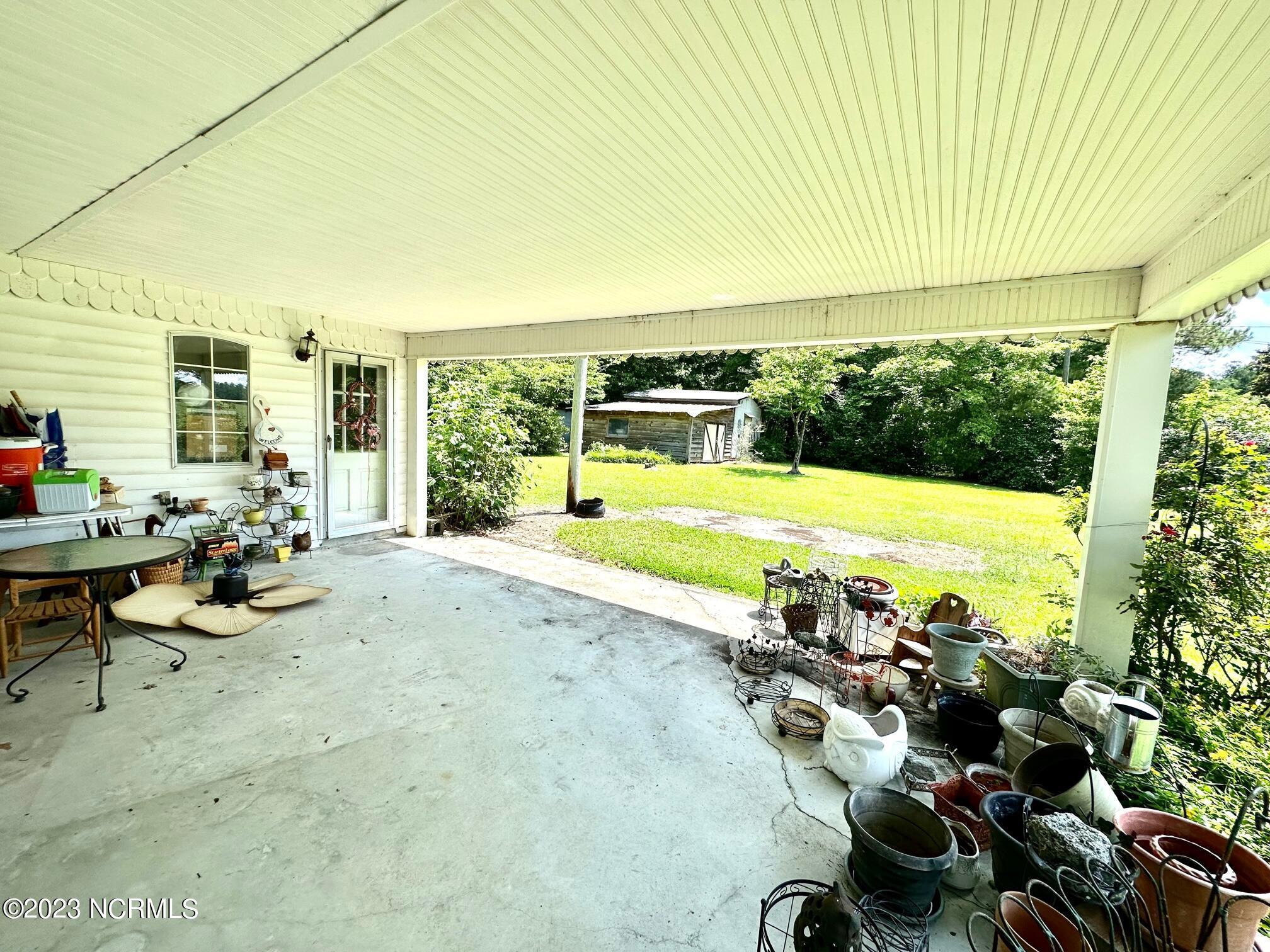 3832 Farmers Union Road Clarkton, NC 28433 - Photo 6 of 36 Spacious Covered Porch