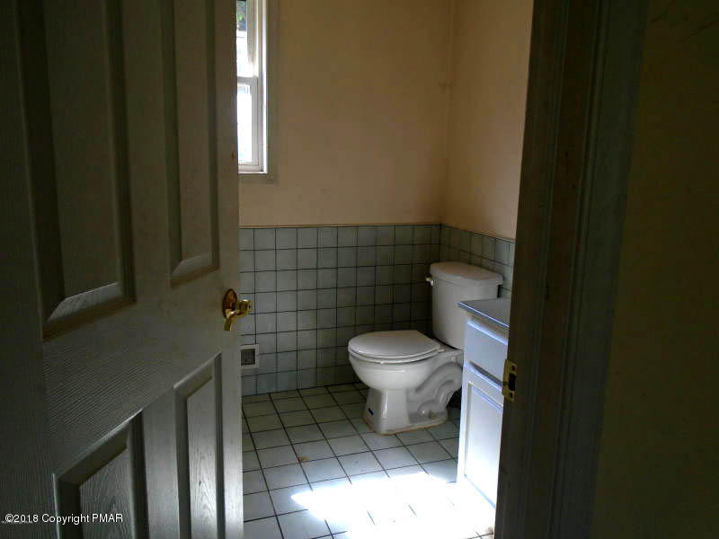 2164 Bushkill Circle Bushkill, PA 18324 - Photo 7 of 10 a bathroom with a toilet and a sink