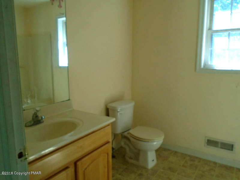 2164 Bushkill Circle Bushkill, PA 18324 - Photo 9 of 10 a bathroom with a sink and a toilet