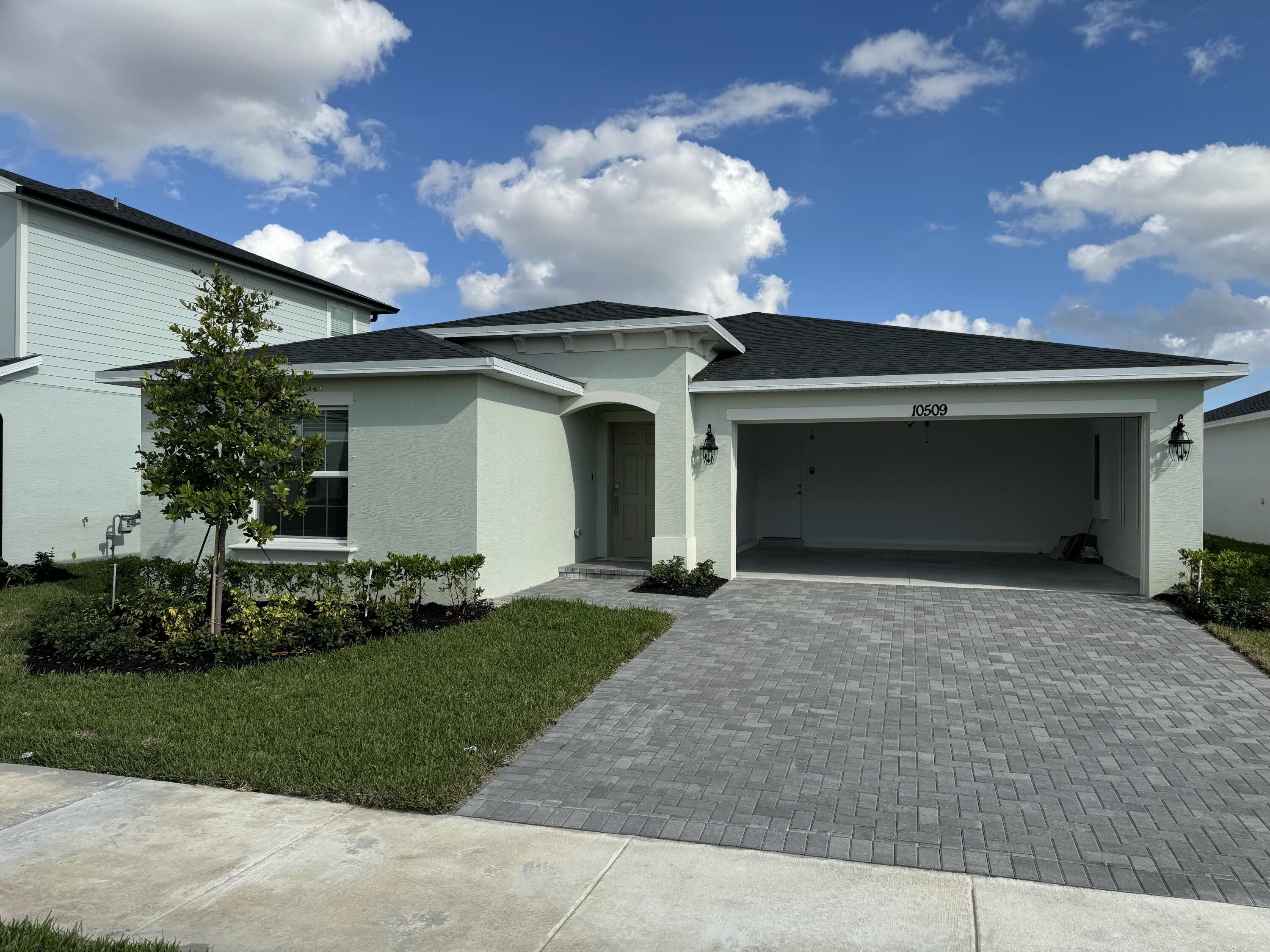 10509 Northwest Suncrest Loop Port Port St. Lucie, FL 34987 - Photo 1 of 40 Front Exposure