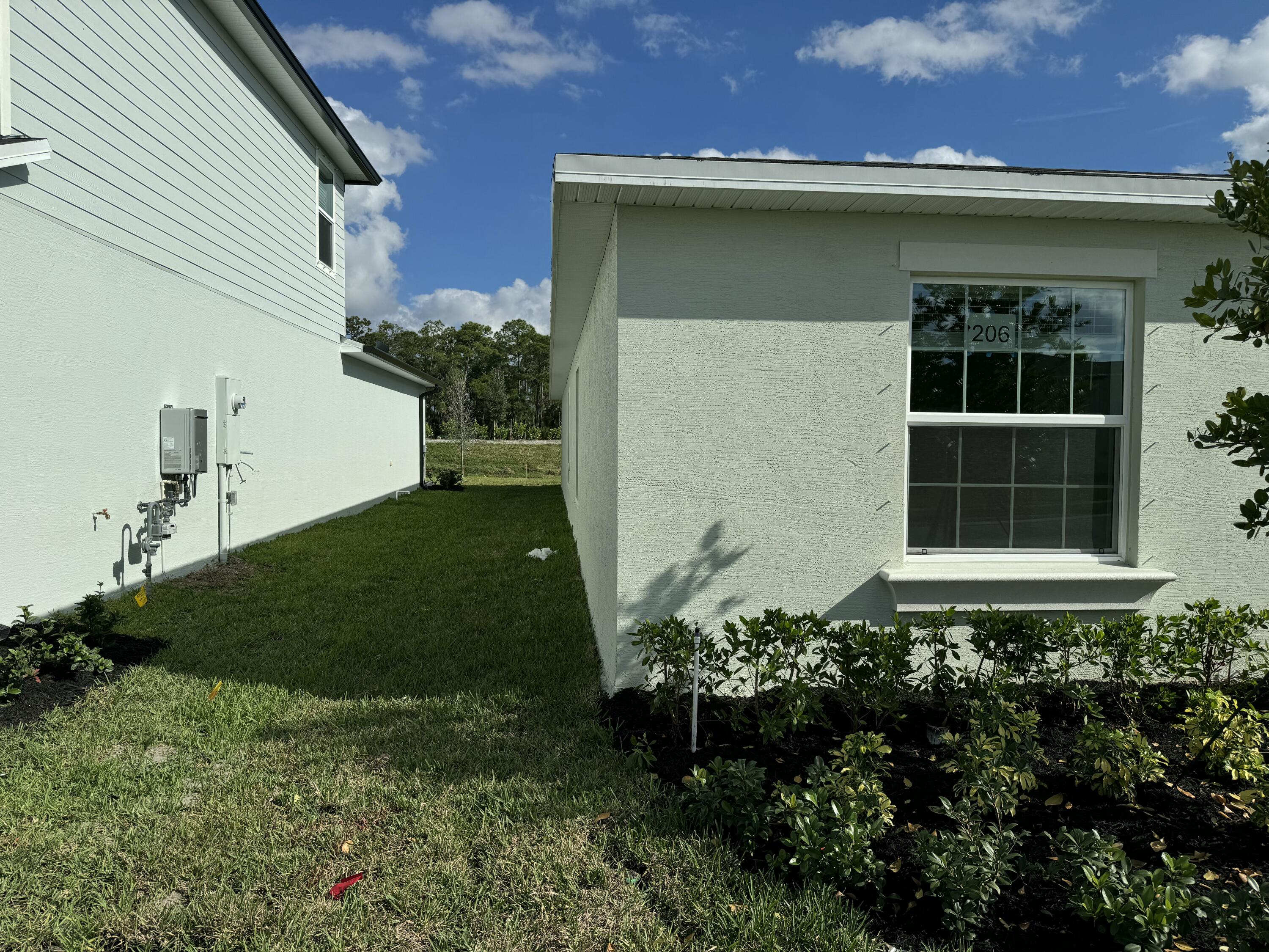 10509 Northwest Suncrest Loop Port Port St. Lucie, FL 34987 - Photo 3 of 40 IMG_7705