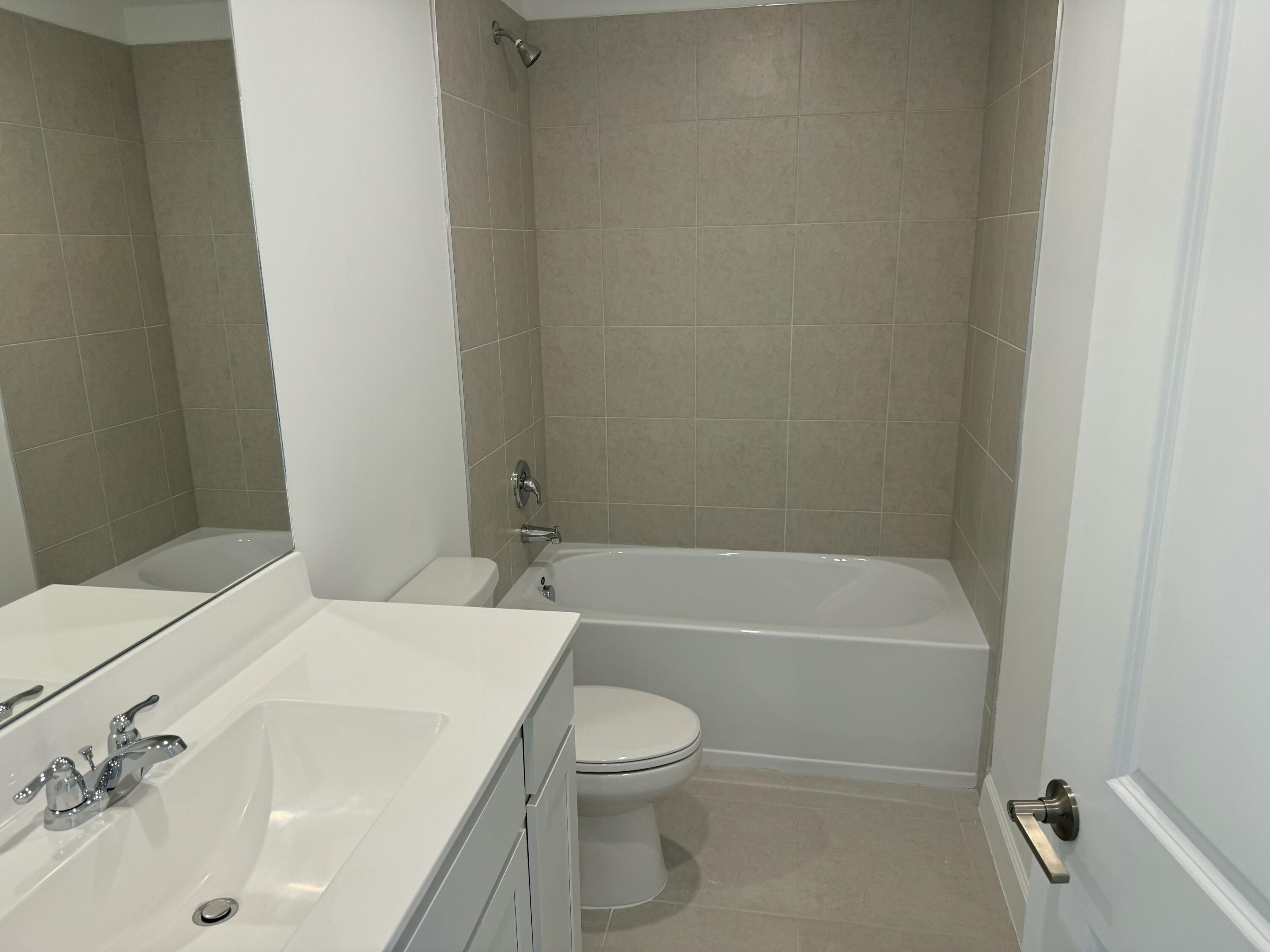 10509 Northwest Suncrest Loop Port Port St. Lucie, FL 34987 - Photo 7 of 40 IMG_7709