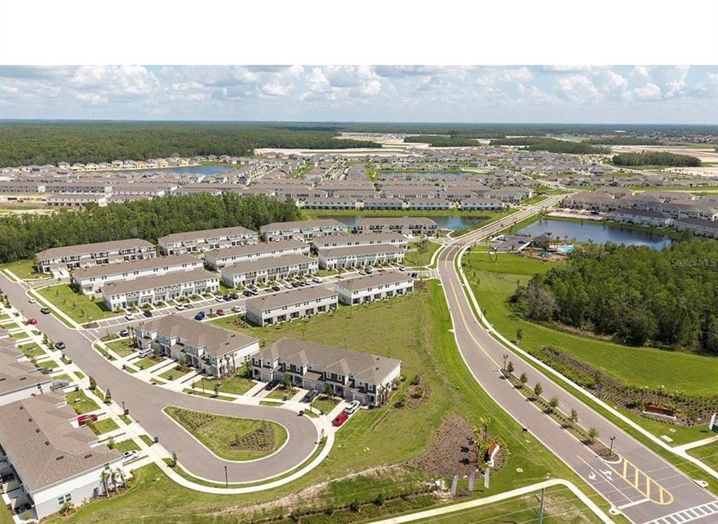 2980 Skyline Loop, Unit 2980 Kissimmee, FL 34758 - Photo 2 of 14 an aerial view of a city