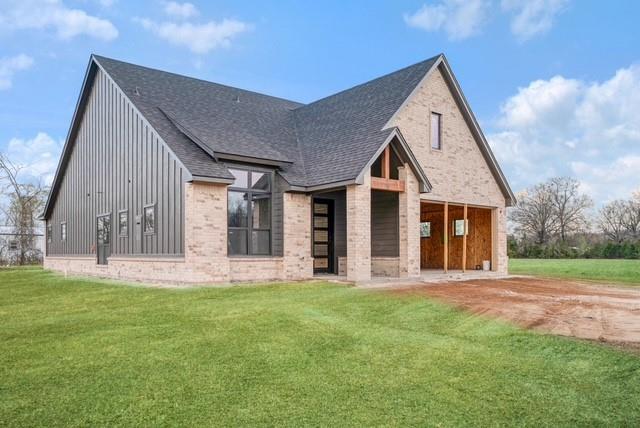 25 Private Road Blossom, TX 75416 - Photo 3 of 7 a front view of house with yard and green space