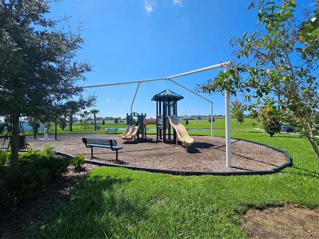 a view of a park with slide