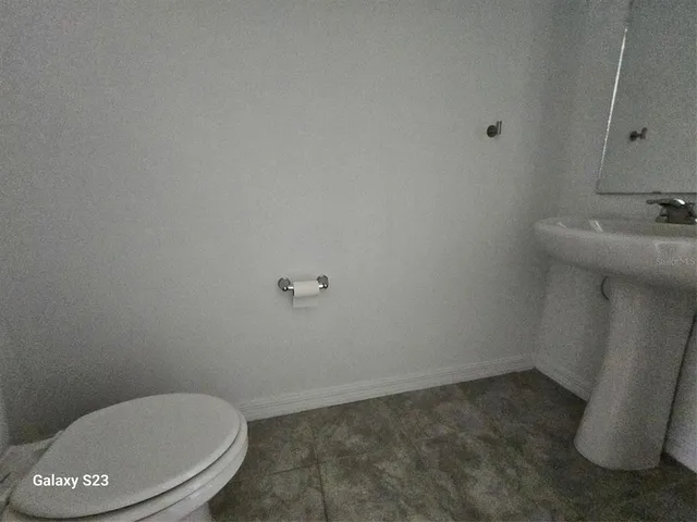 a bathroom with a toilet