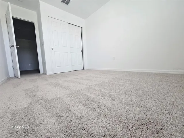 an empty room with closet