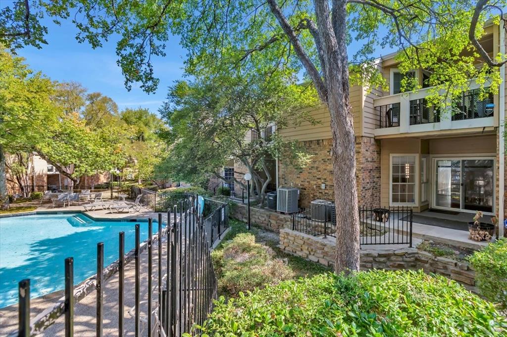 14277 Preston Road, Unit C315 Dallas, TX 75254 - Photo 6 of 26 Community pool with view of patio